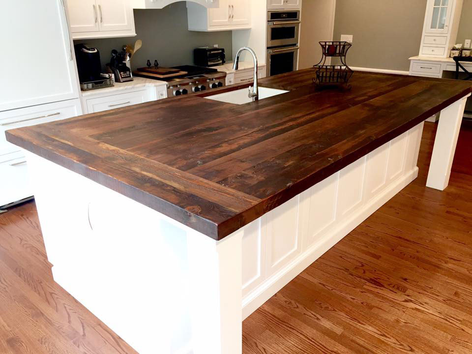 reclaimed wood kitchen island with built in table